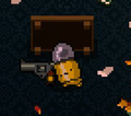 A Bullet Kin taking cover behind a flipped Table.