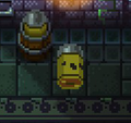An Incapacitated Bullet Kin (right) and a Bullet Kin in a barrel (left).